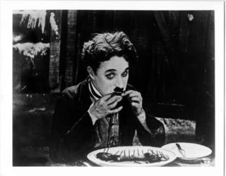 Chaplin Eating Boots