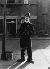 Zoom easy street as the policeman